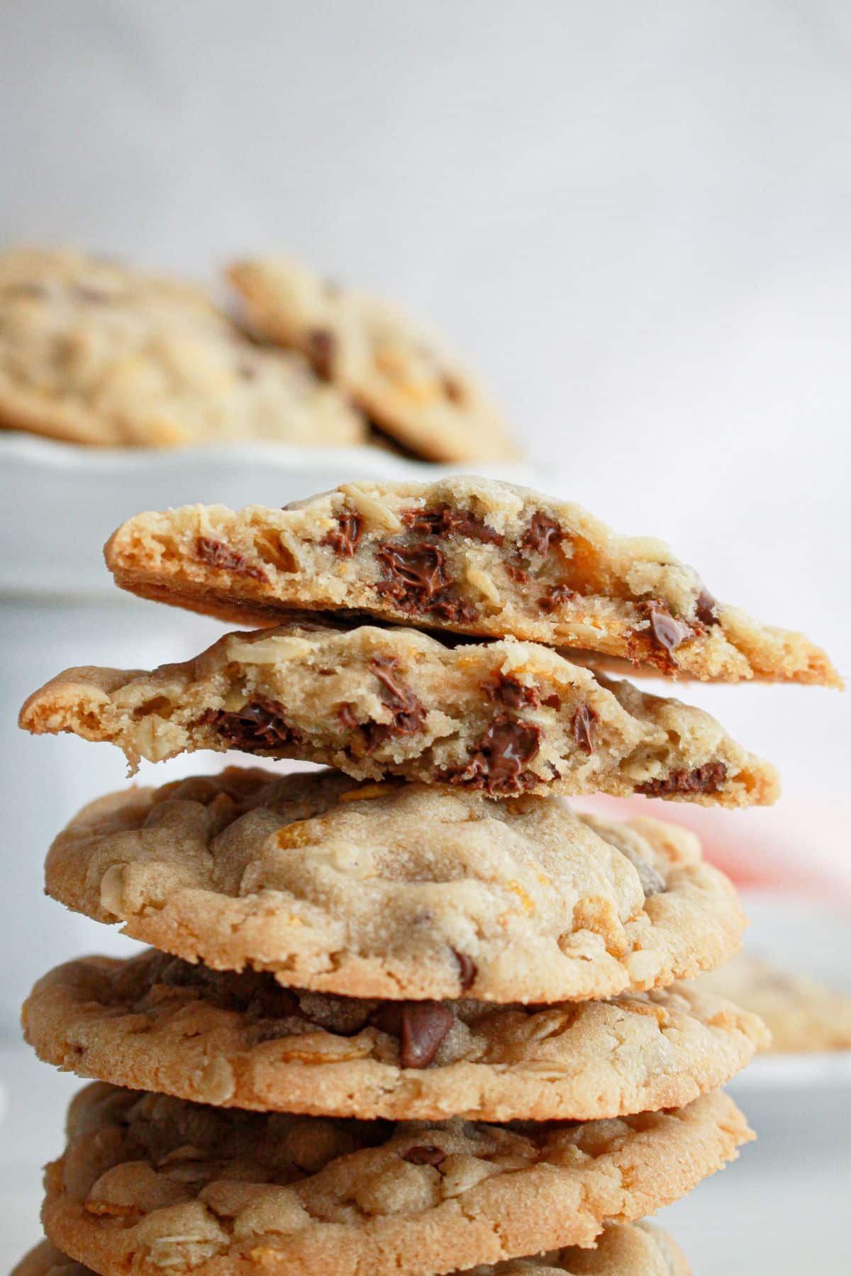 stack of crunchy chocolate chip cookies on a table.