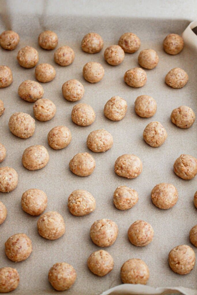 truffles on a parchment lined baking sheet.