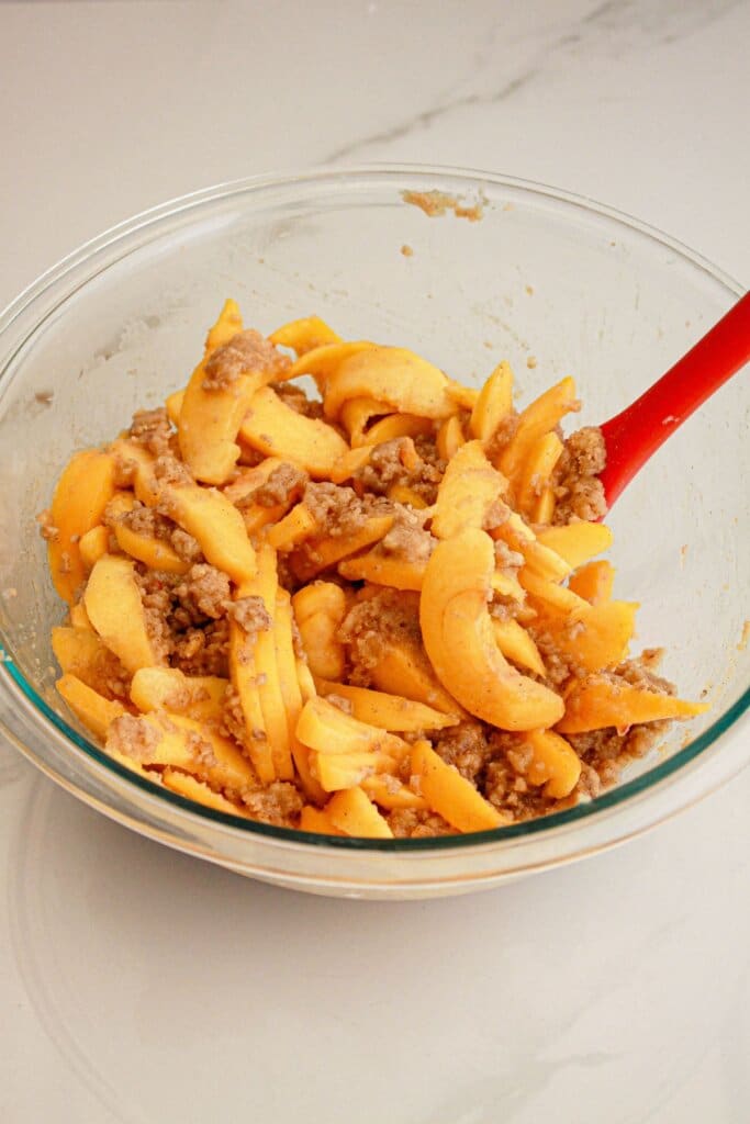 filling being mixed in a large glass bowl.