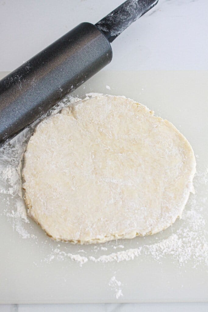 crust be rolled out on a wooden cutting board.