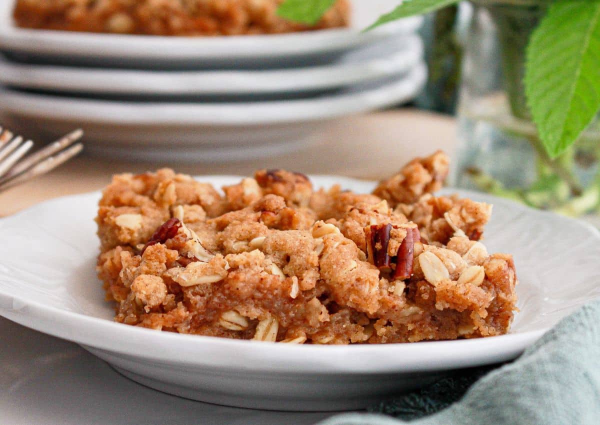 slice of applesauce oat bars on a small plate.