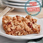 slice of applesauce oat bars on a small plate.