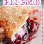 Blueberry cream cheese egg roll on a plate broken in a half.