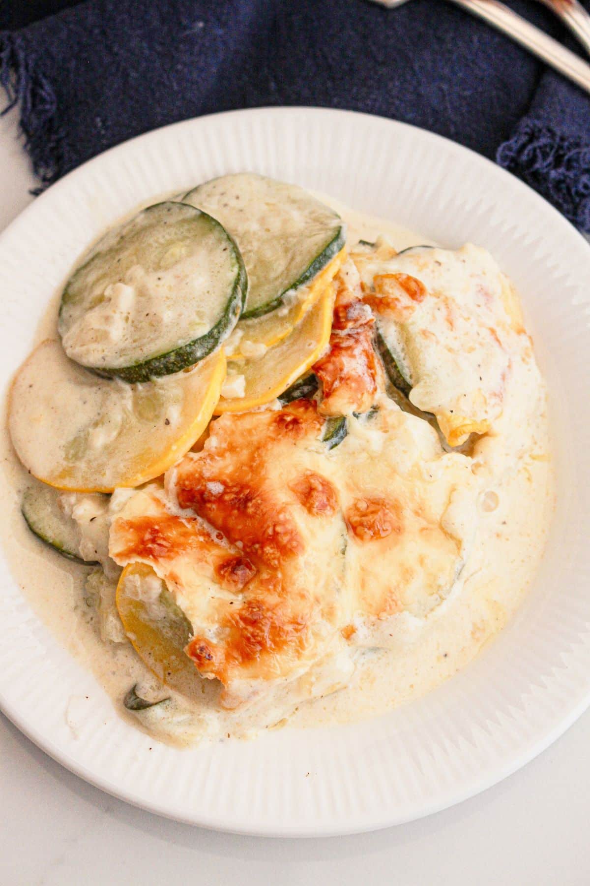 plate full of zucchini and squash au gratin.