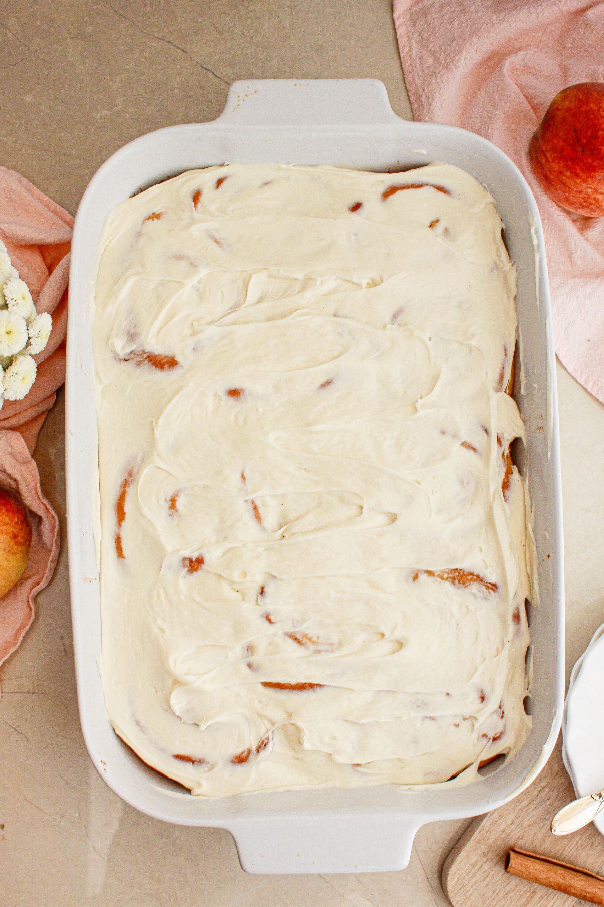 Cinnamon rolls in a baking dish ready to be served.