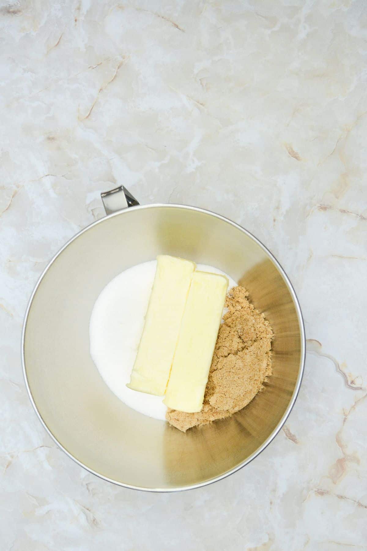 Butter and sugar in bowl.