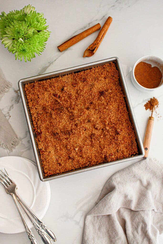 Pumpkin pie crisp in a baking dish ready to cut.
