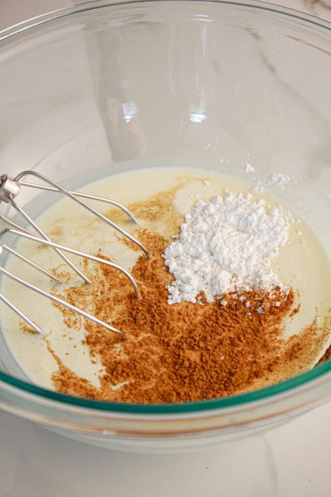 Whipped cream being made in bowl.
