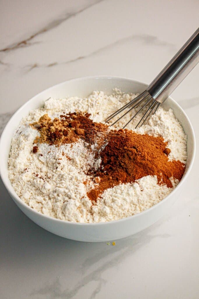 Dry ingredients being mixed together in a small bowl.