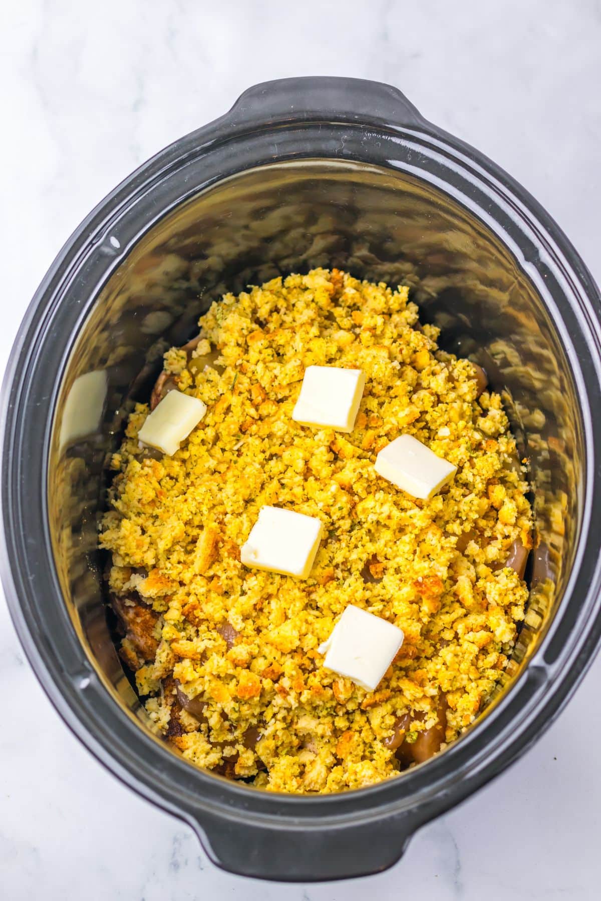 Butter on top of stuffing.