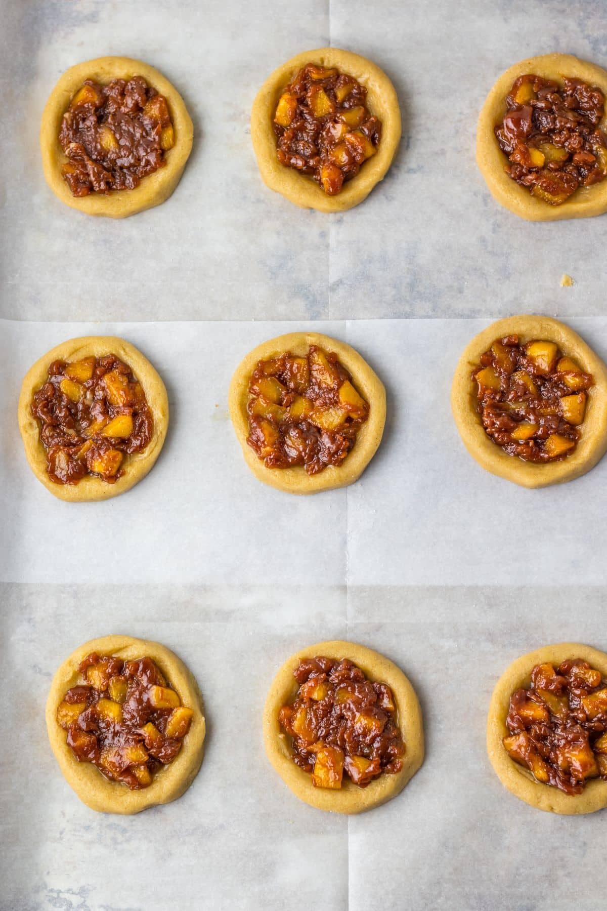 Unbaked cookies on pan.