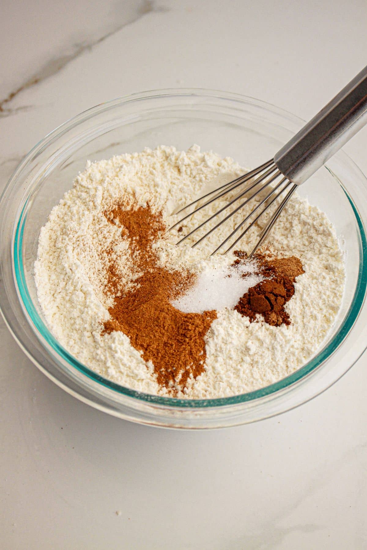 Dry ingredients mixed in a bowl.
