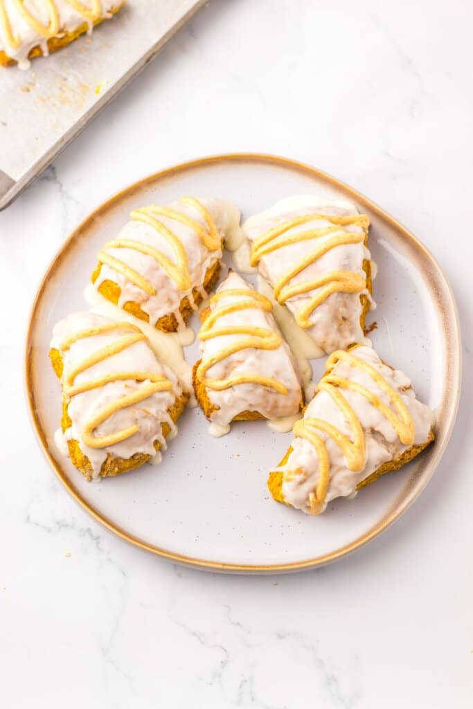 Starbucks pumpkin scones on a small plate.