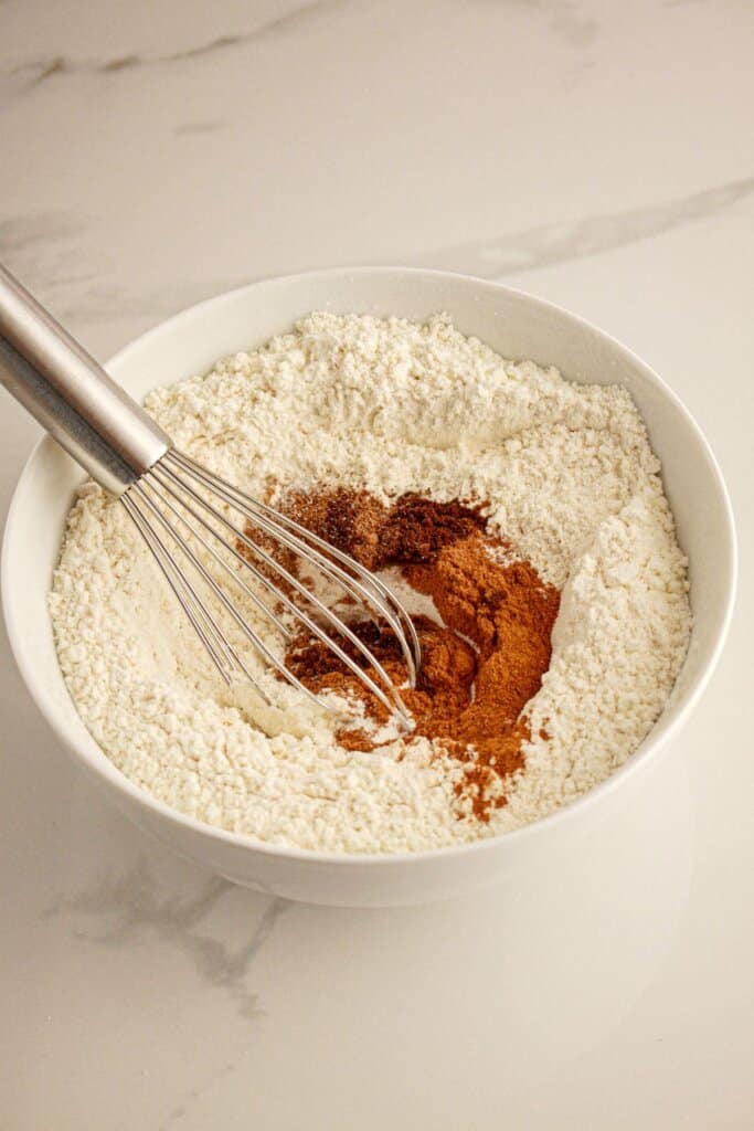 Dry ingredients being mixed in a bowl.