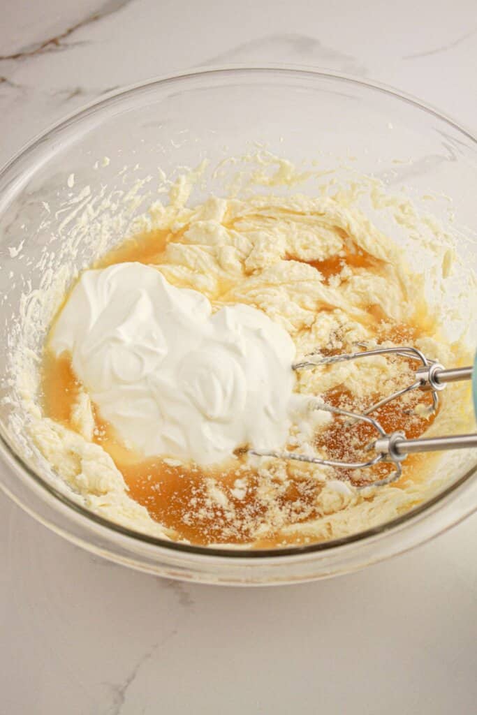 Batter being mix in glass bowl.