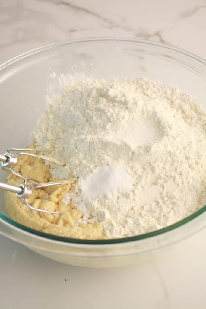 Dry ingredients being added to cookie dough.