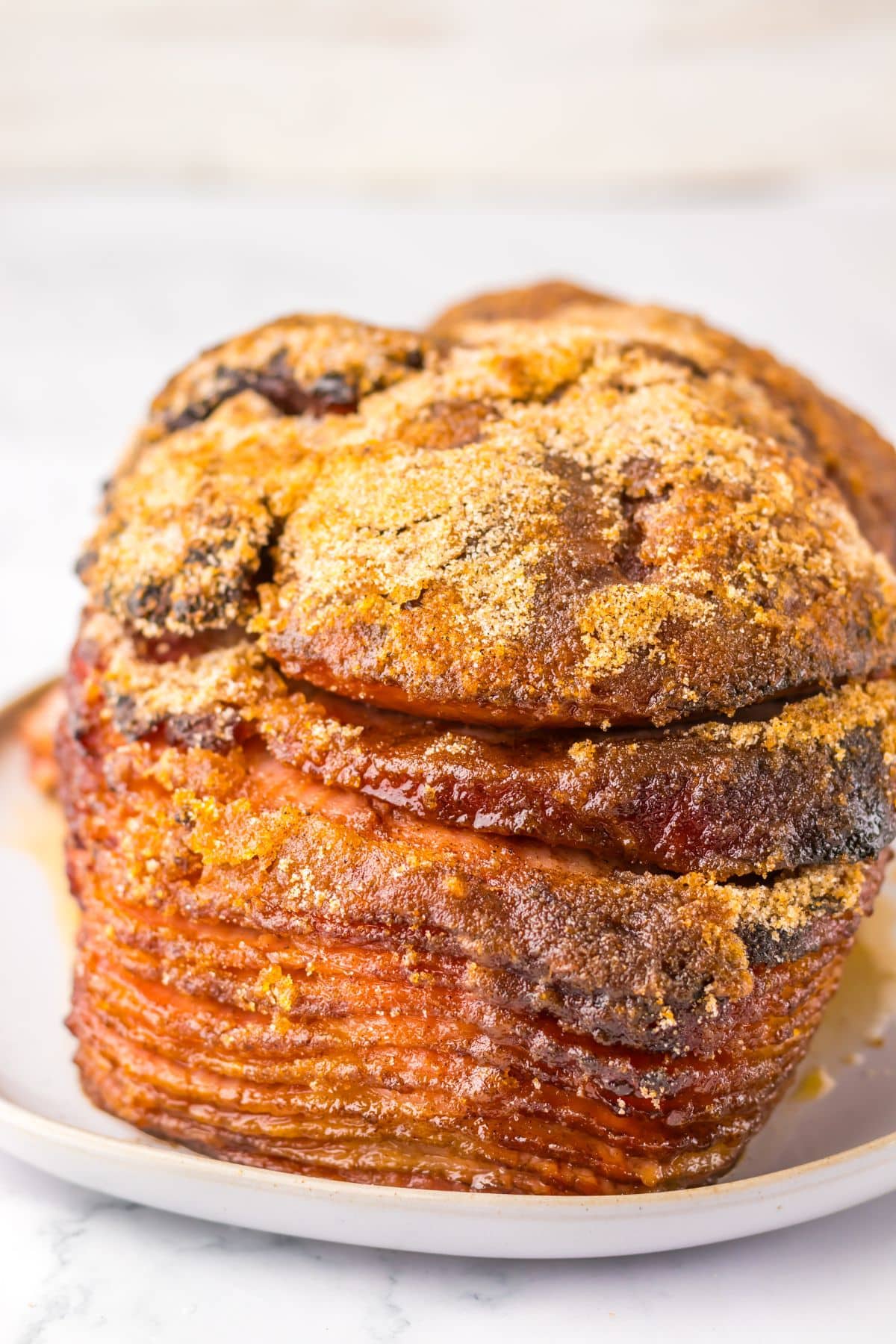 Honey baked ham on a platter.