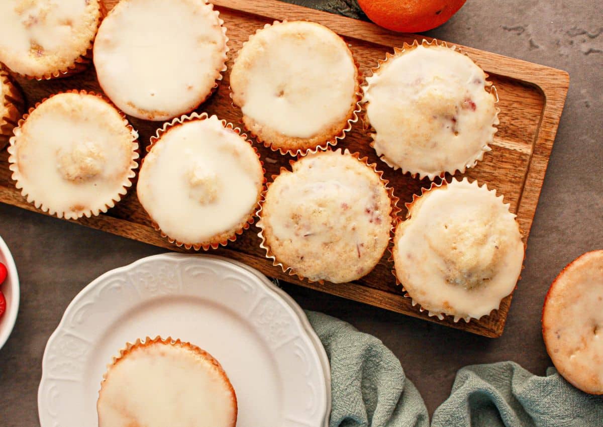 Orange cranberry muffins on a tray.