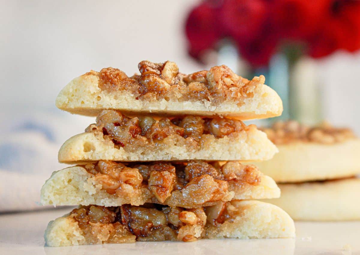 Four havles of pecan pie cookies on a counter.