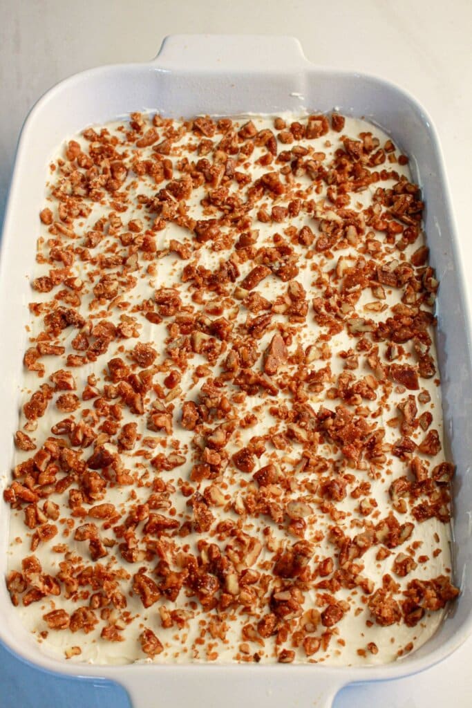 Pecan pie lasagna in a baking dish.