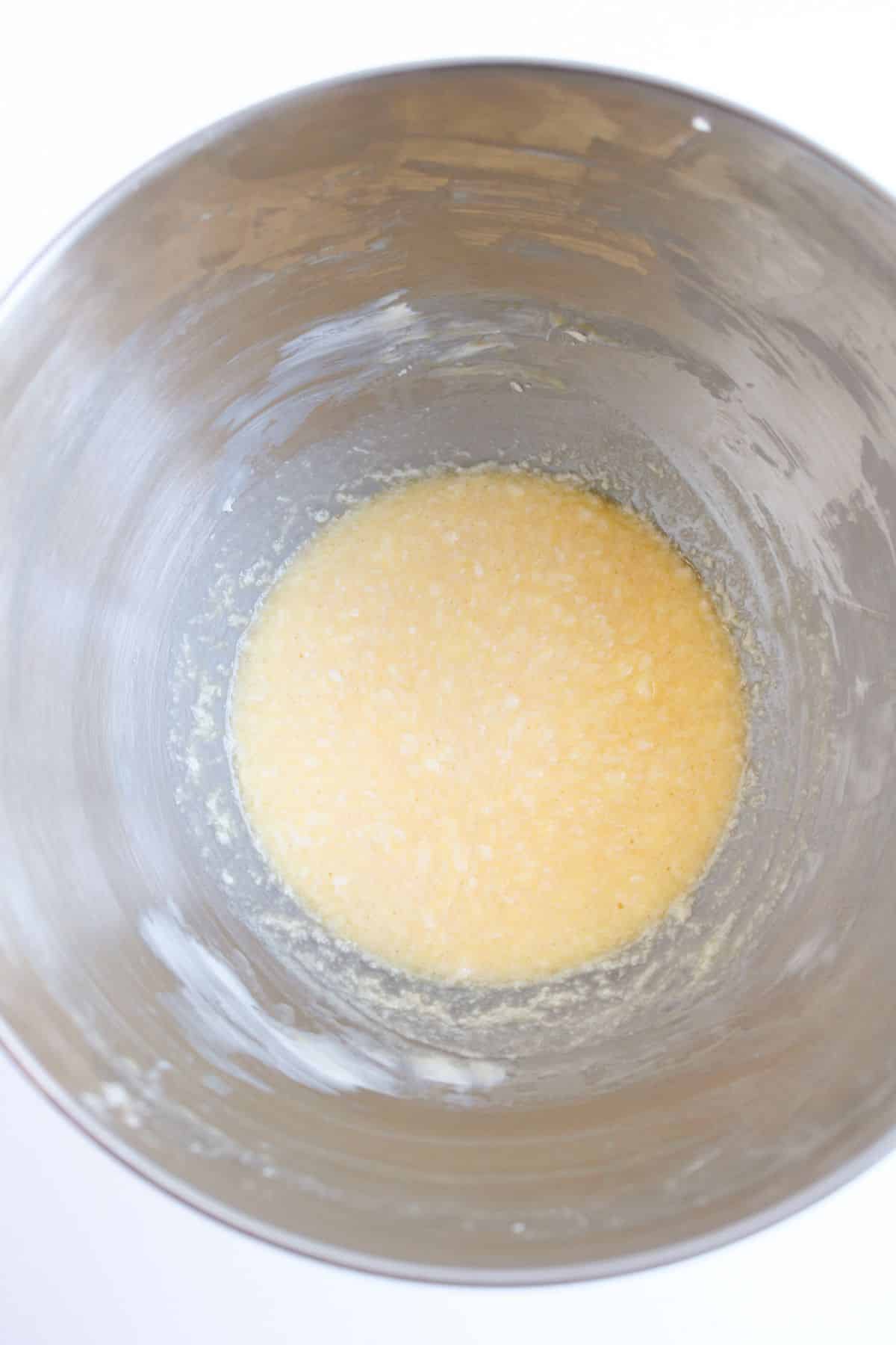 Butter and eggs in bowl.