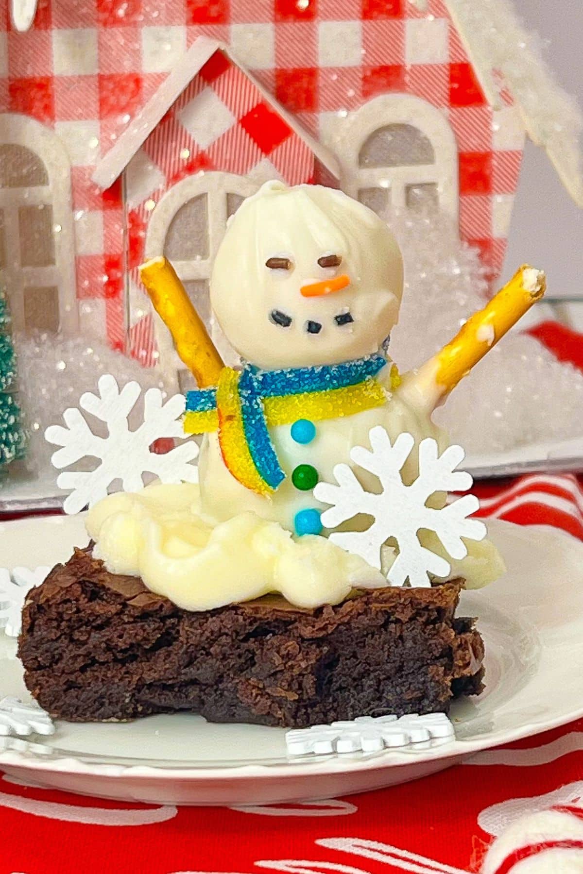 Snowman brownie on a plate.
