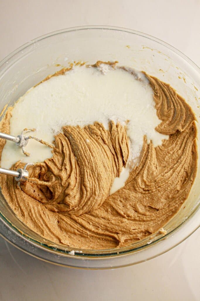 Buttermilk being added to batter.