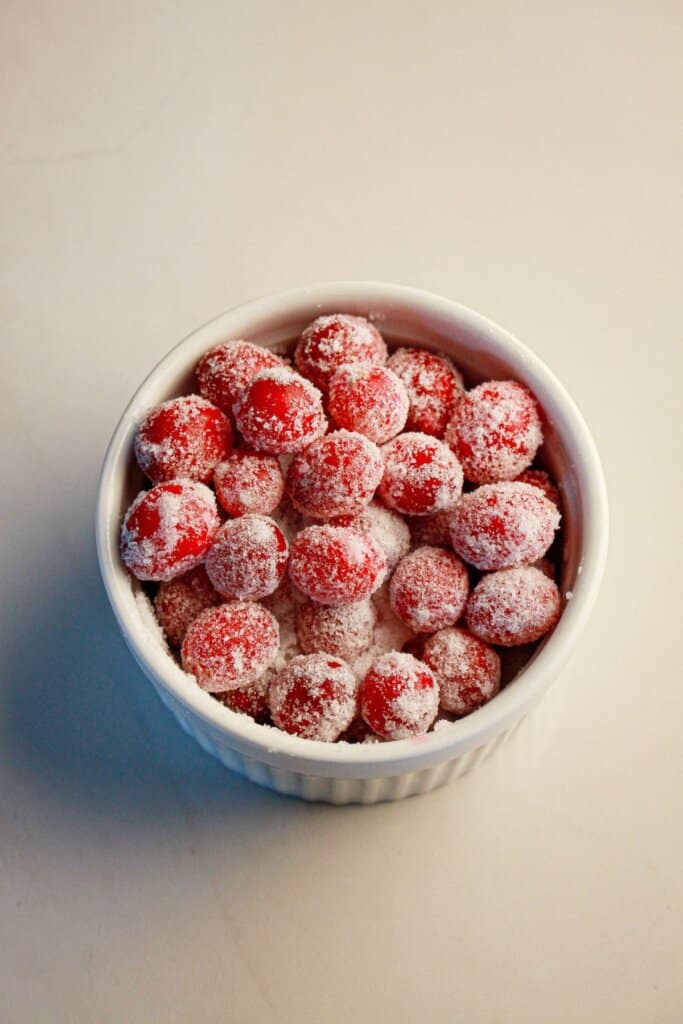 Sugared cranberries in bowl.