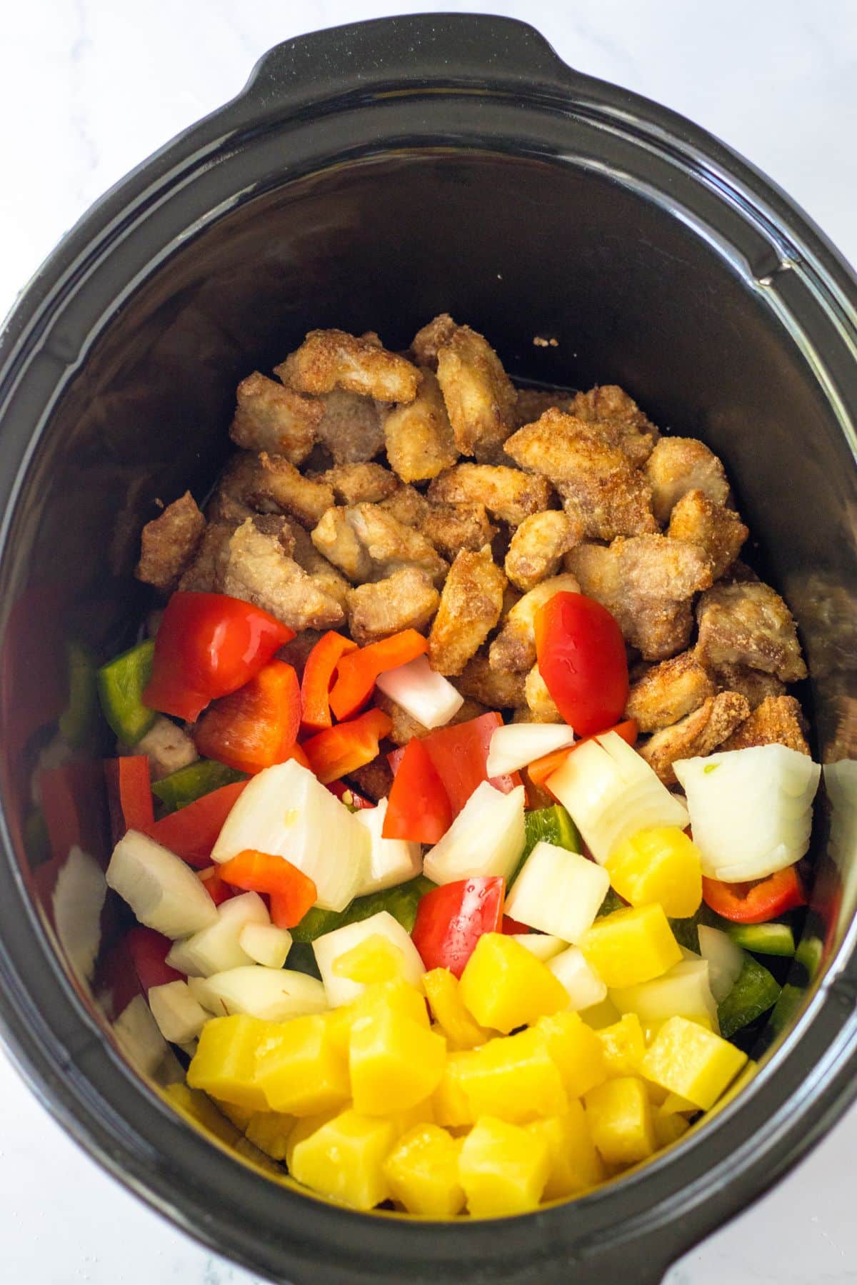 Ingredients in a slow cooker.