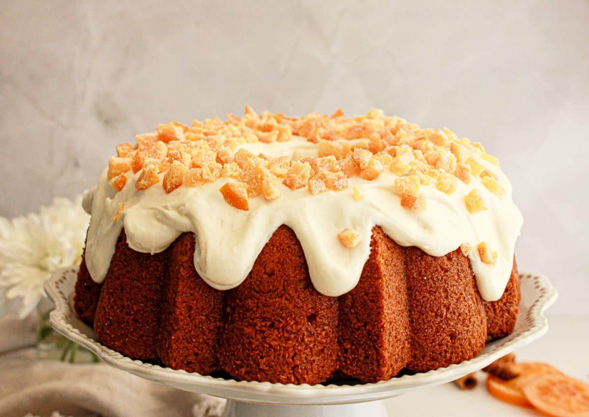 Whole pound cake on cake stand.