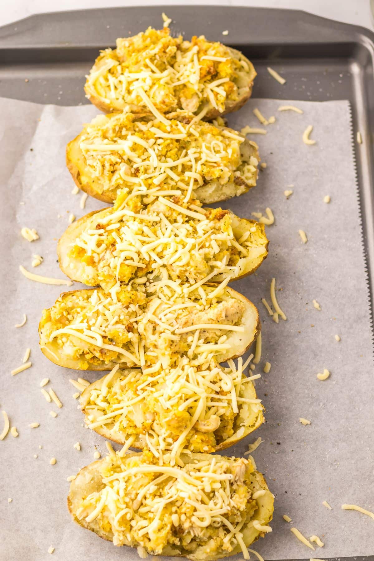Cheese on top of potatoes.