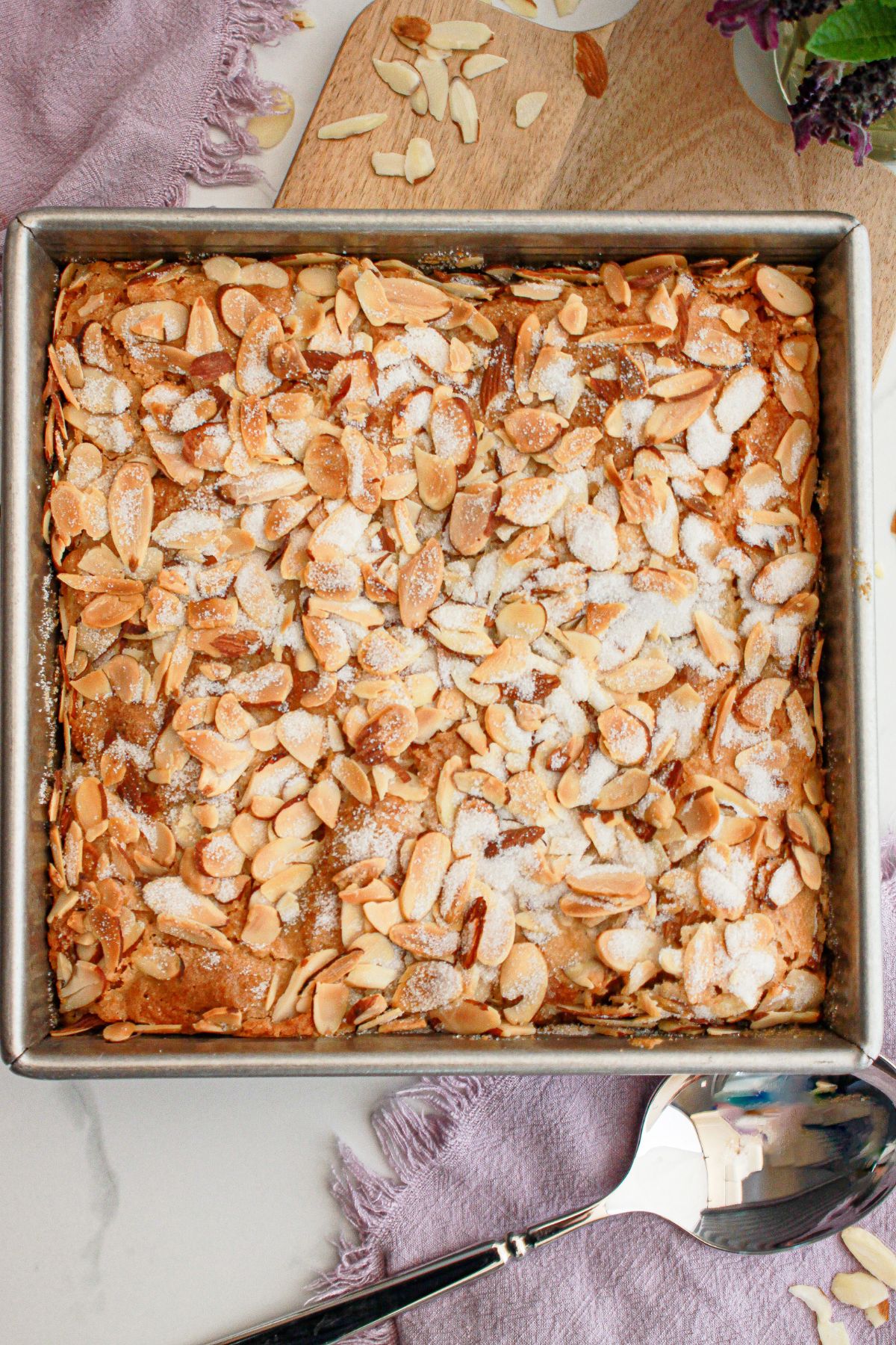 Almond crossiant bread pudding in a baking dish.