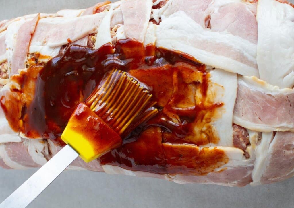 BBQ sauce being brushed on.