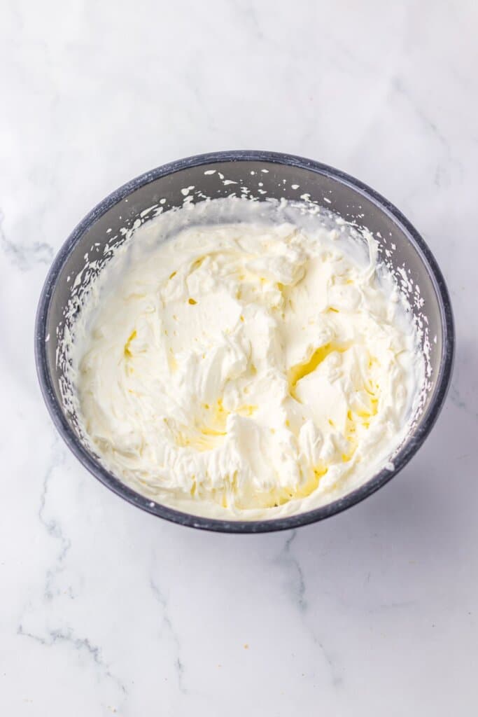 Heavy cream in a large bowl.