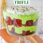 Glass bowl filled with trifle and topped with sprinkles.