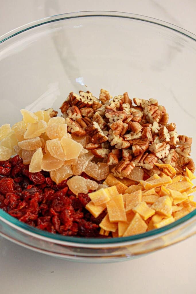 Fruit and nuts in a large bowl.