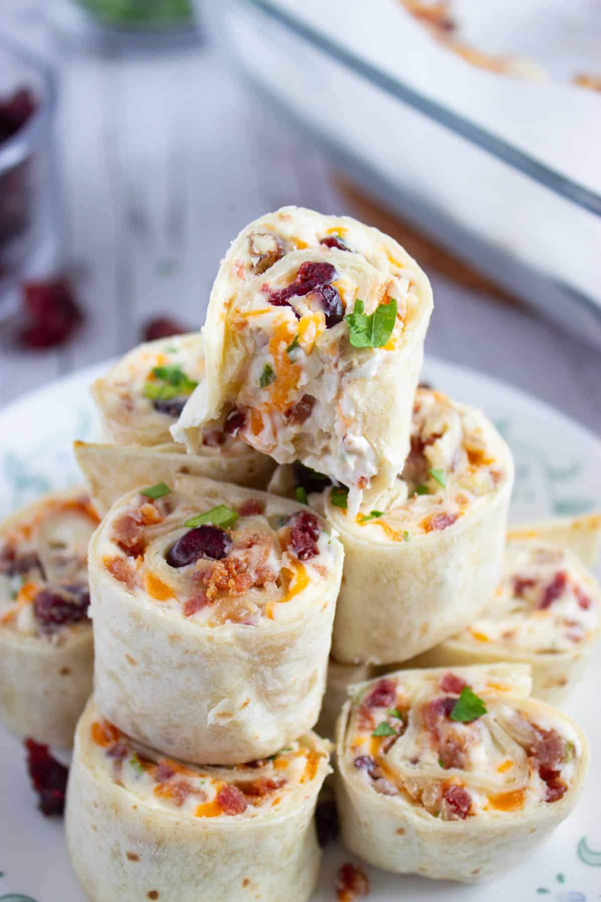 Pinwheels stacked in a pyramid on a plate.