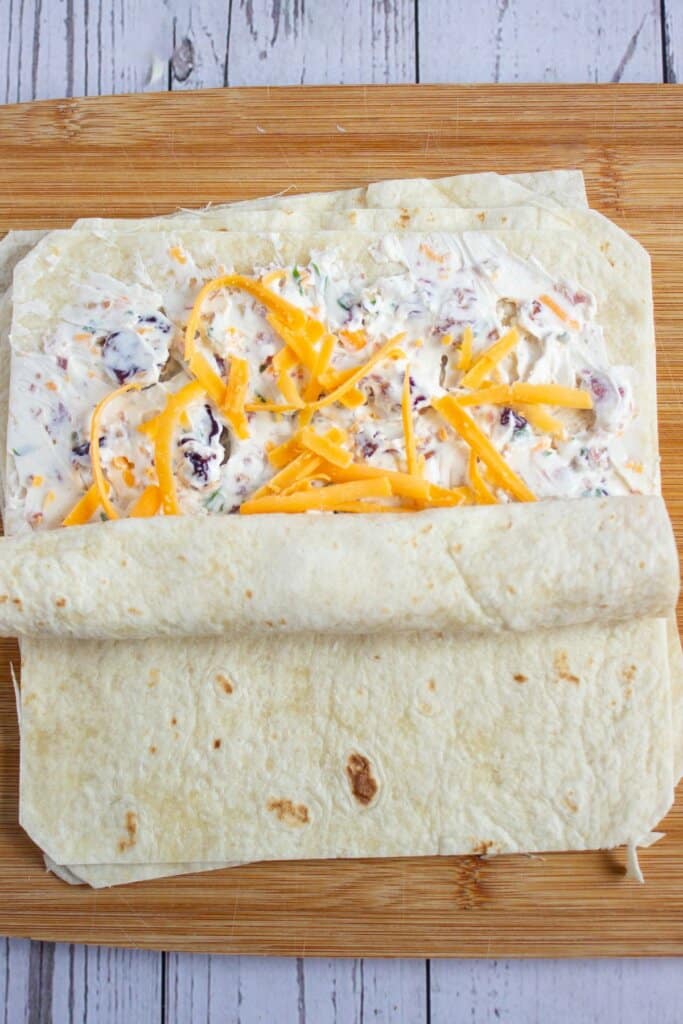Tortillas being rolled.