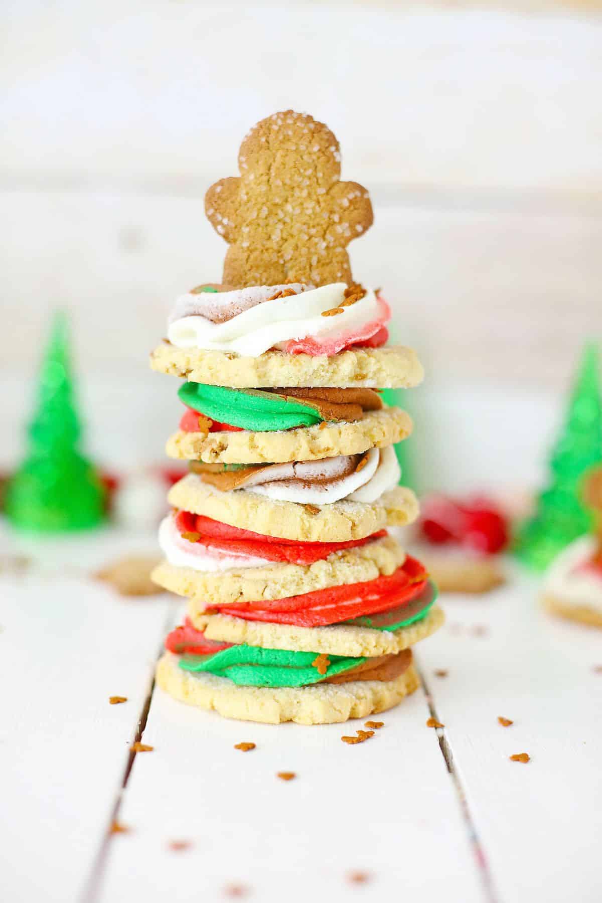 Frosted gingerbread cookies stacked on top of each other.