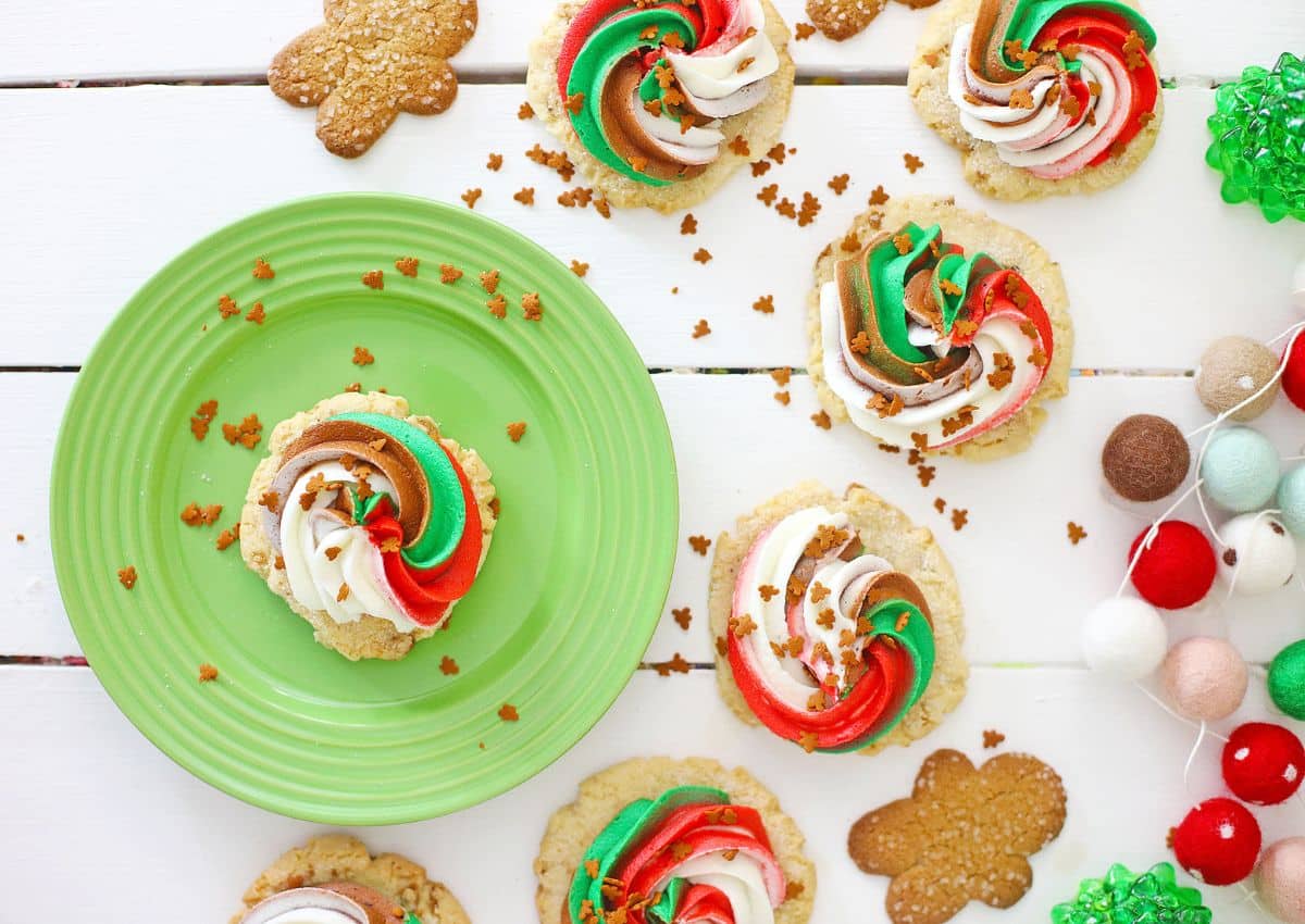 Frosted gingerbread cookie on a plate.