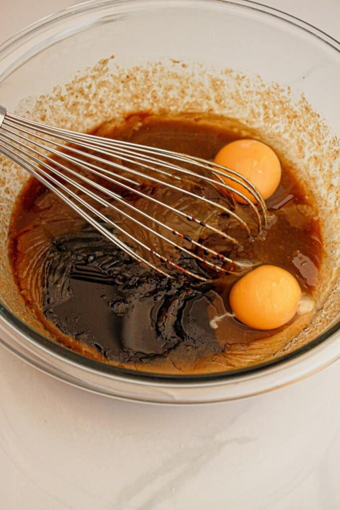 Wet ingredients in a glass mixing.
