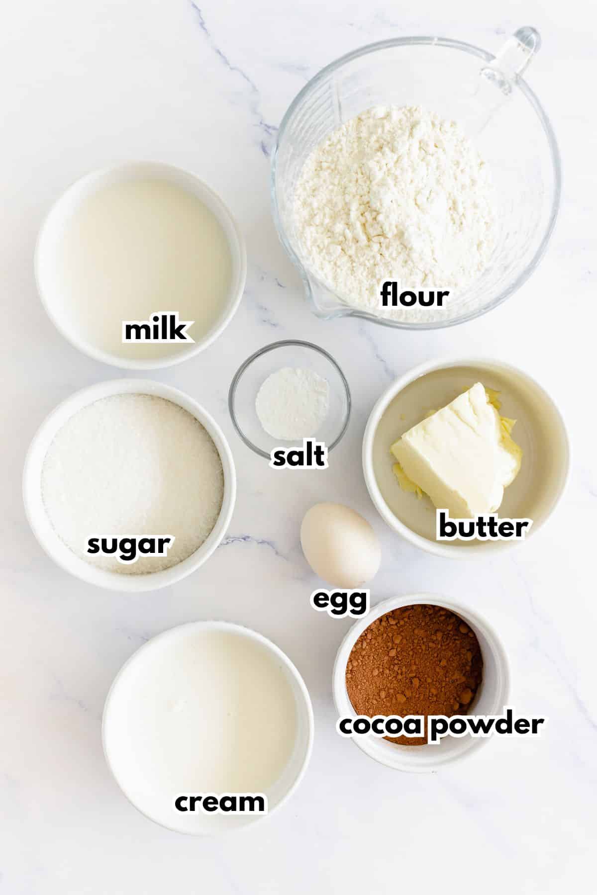Bowls of ingredients on a table.