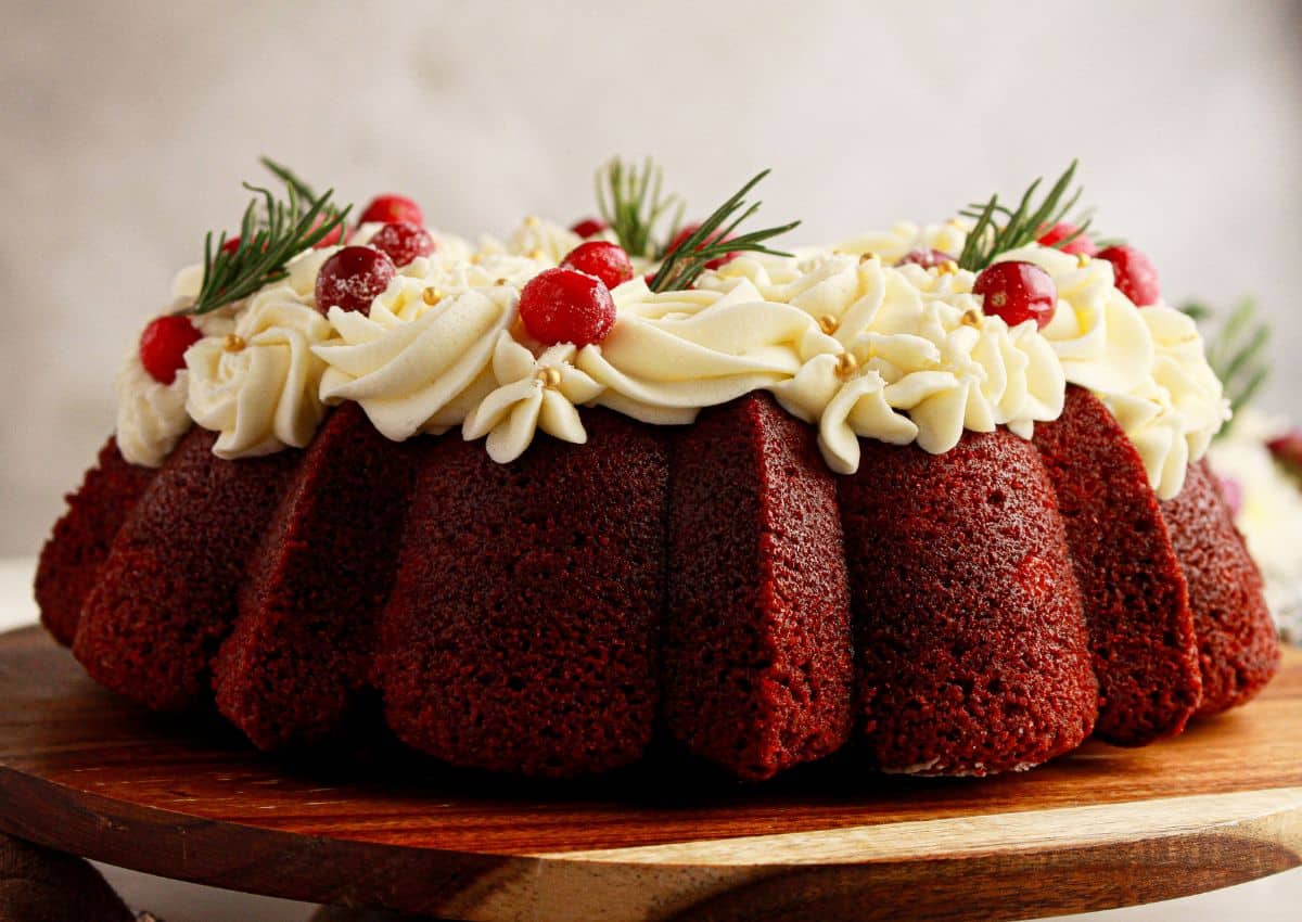 Red velvet bundt cake on a platter.