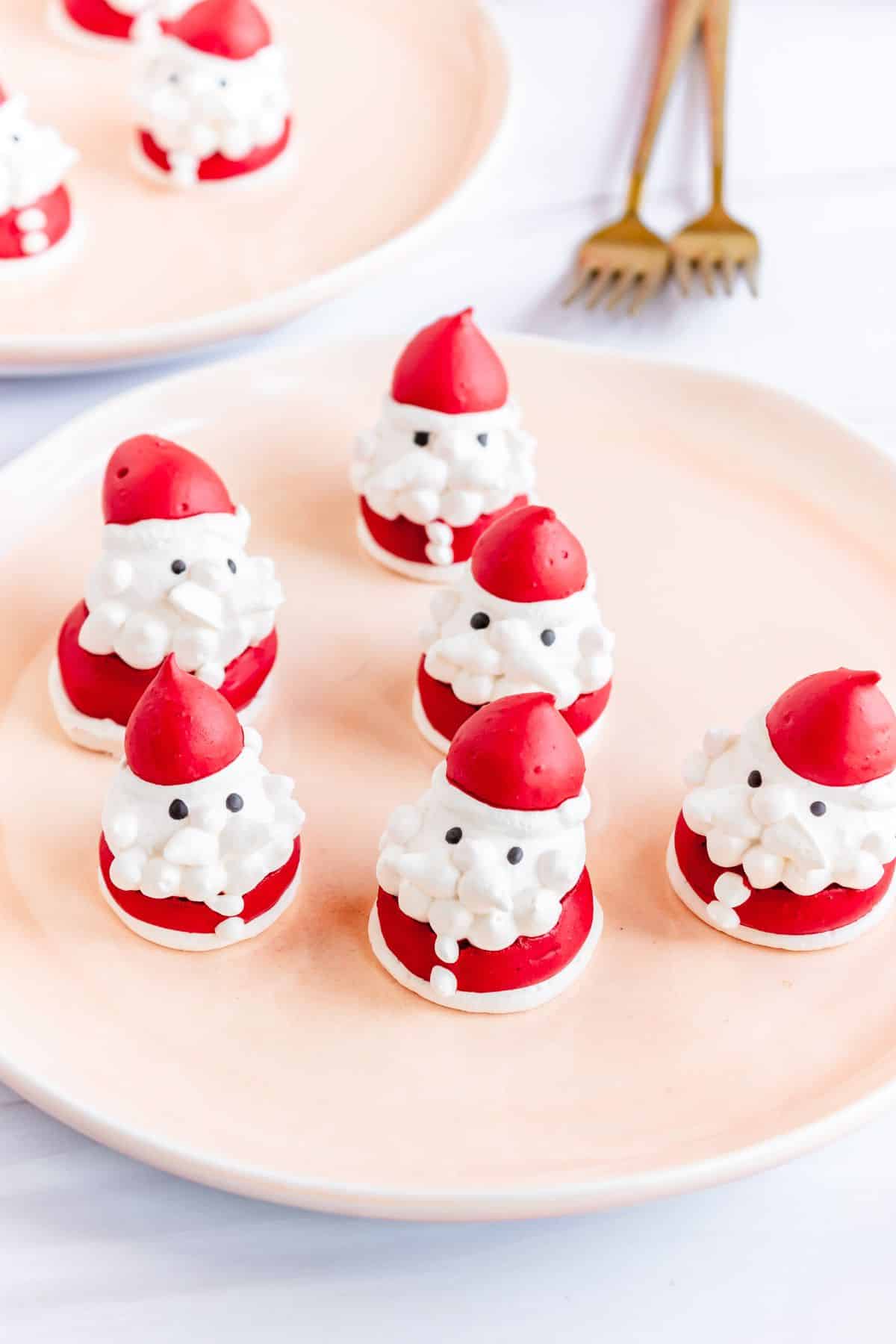 Santa Meringue Cookies on a plate.