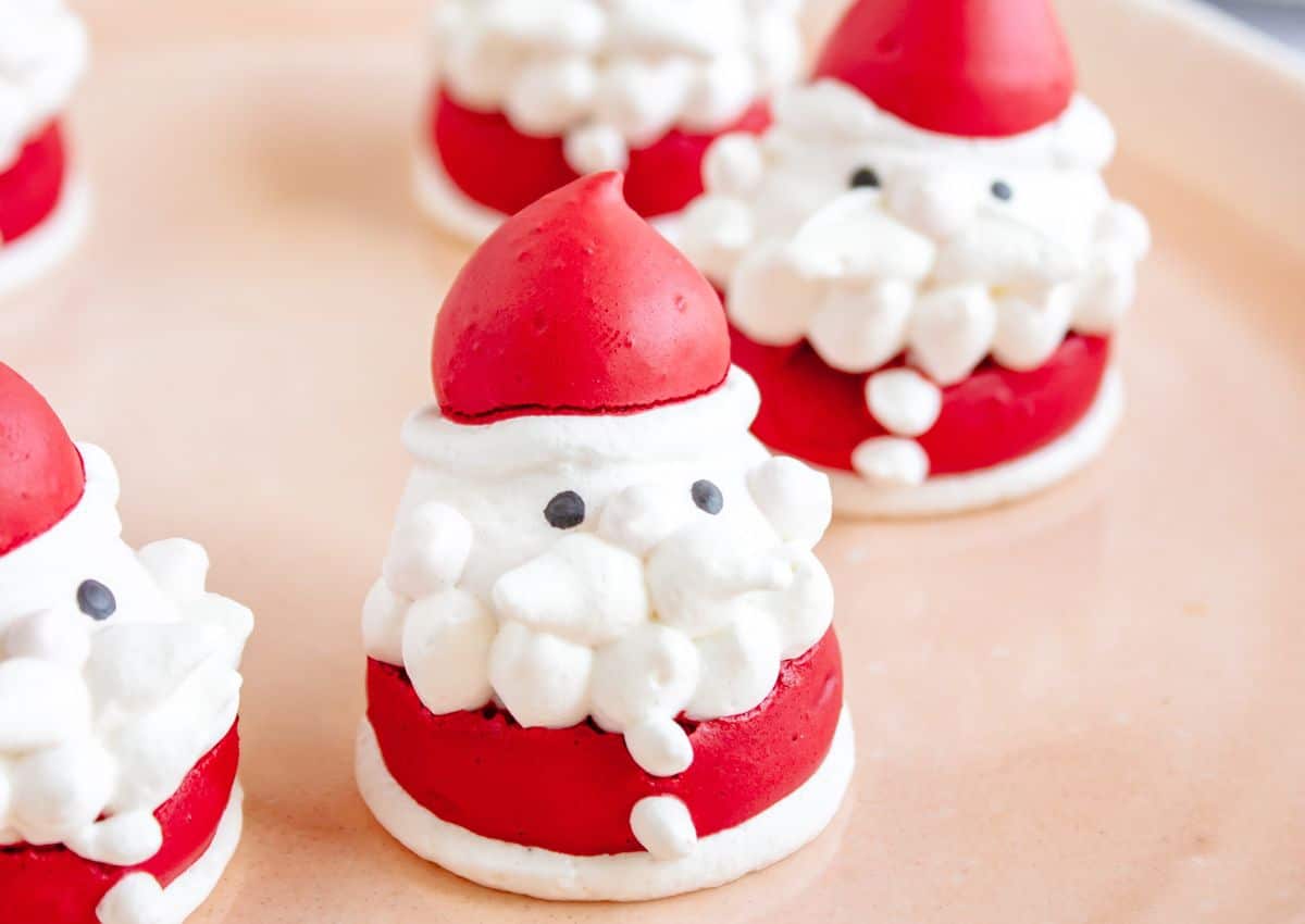 Santa Meringue Cookies on a plate.