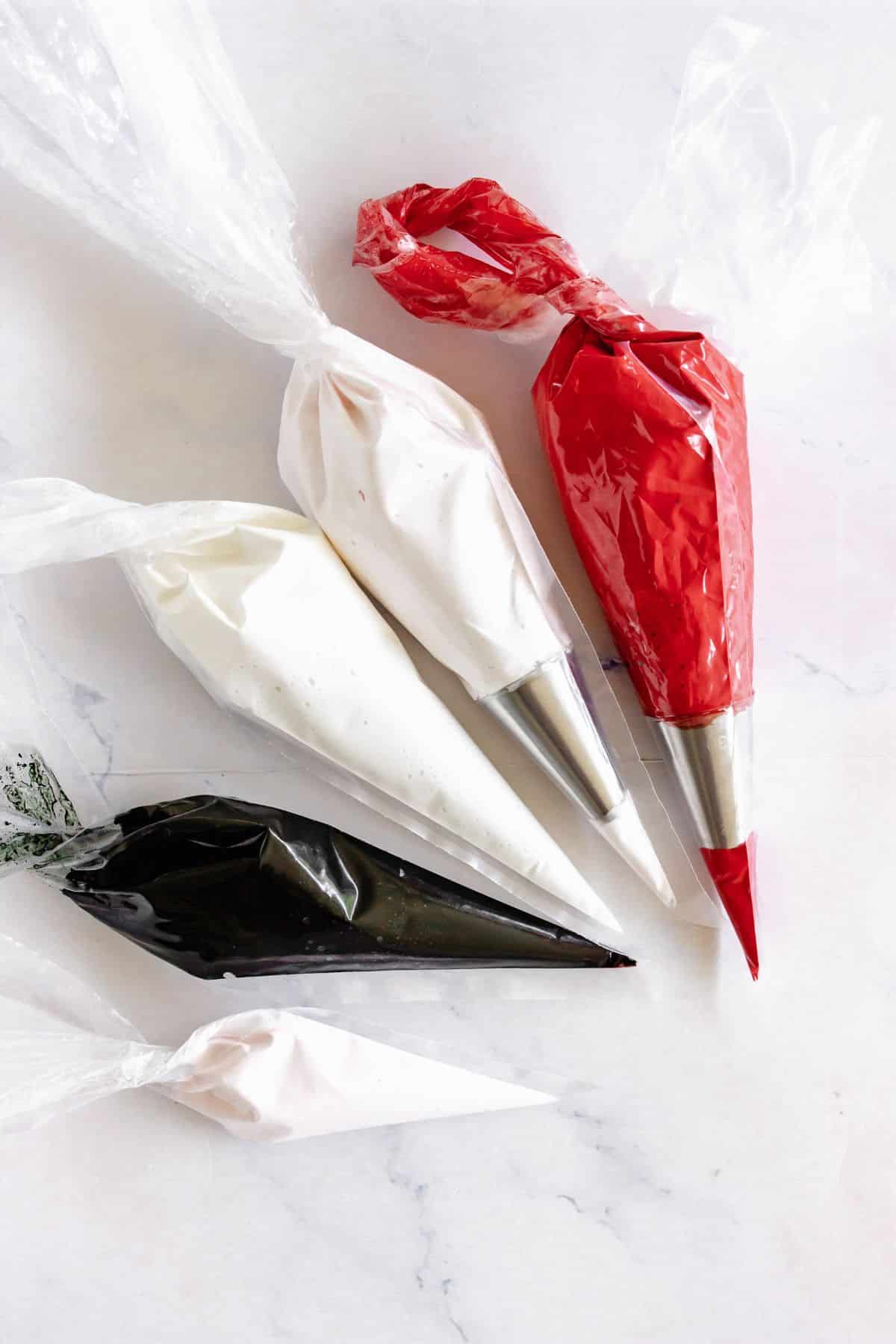 Piping bags full of dough.