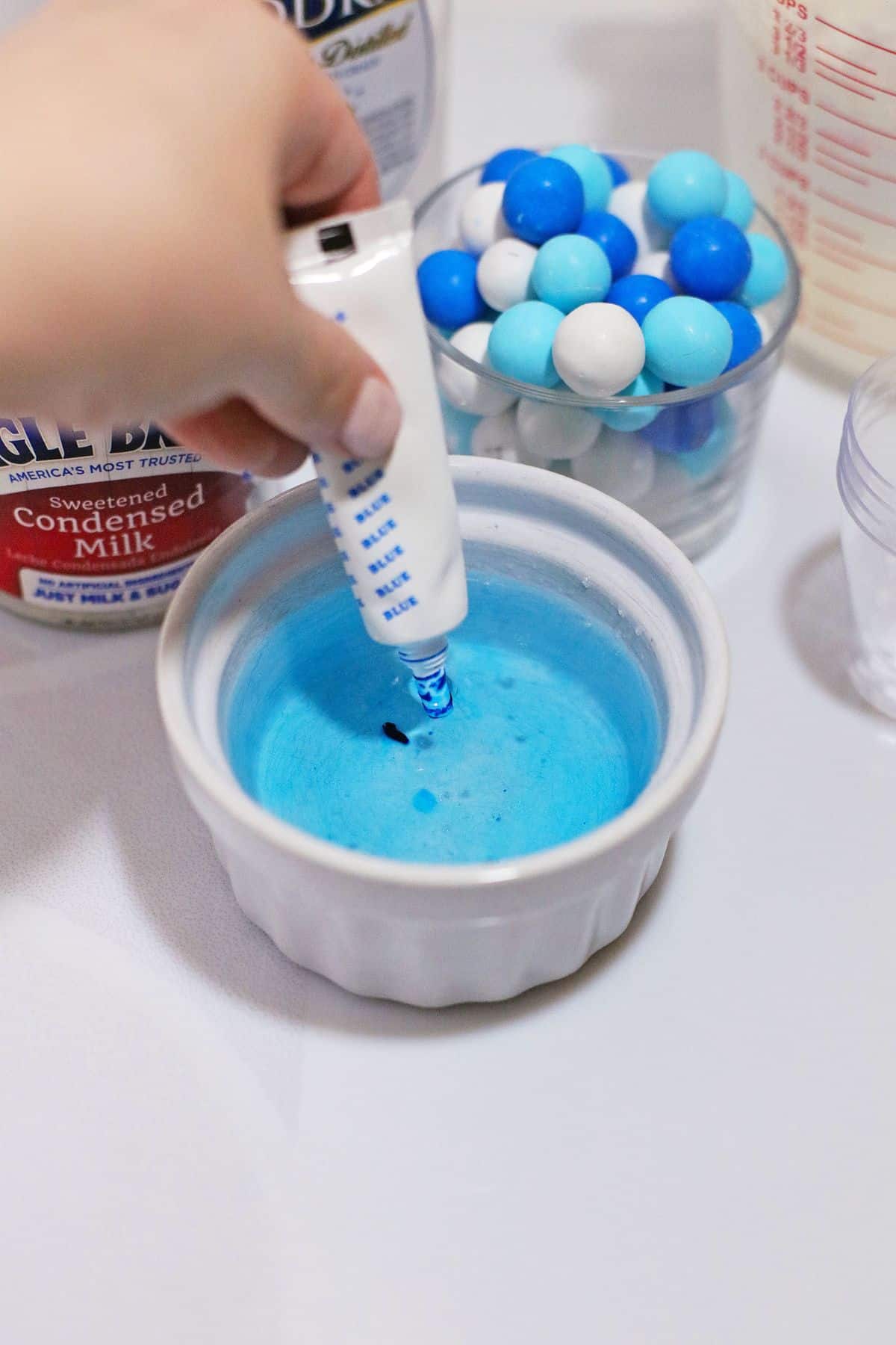 Food coloring being added to ramkin.