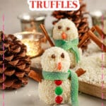 Snowman truffles on a counter.