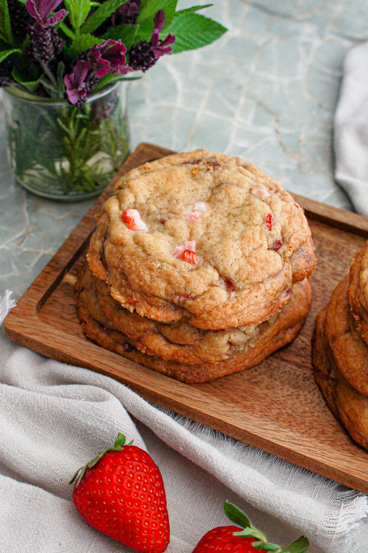 Cheesecake stuffed cookies on a platter.