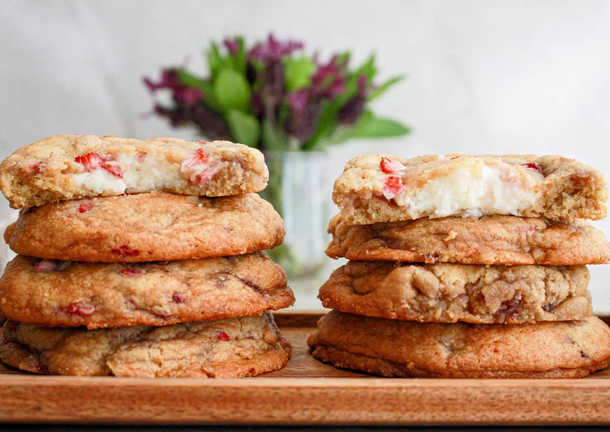 Cheesecake stuffed cookies on a platter.